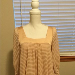 Blush colored blouse from Anthropologie